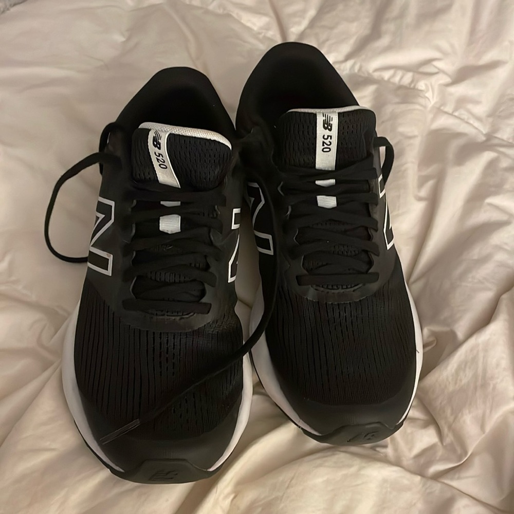 Size 10 black new balance sneakers.
